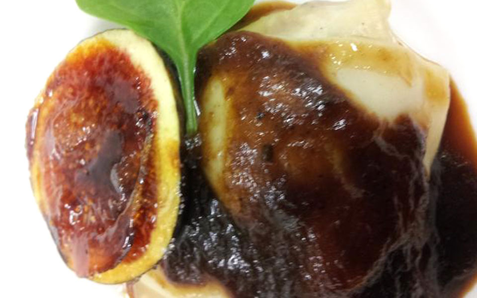 Duck candy ravioli with figs and caramelized fig
